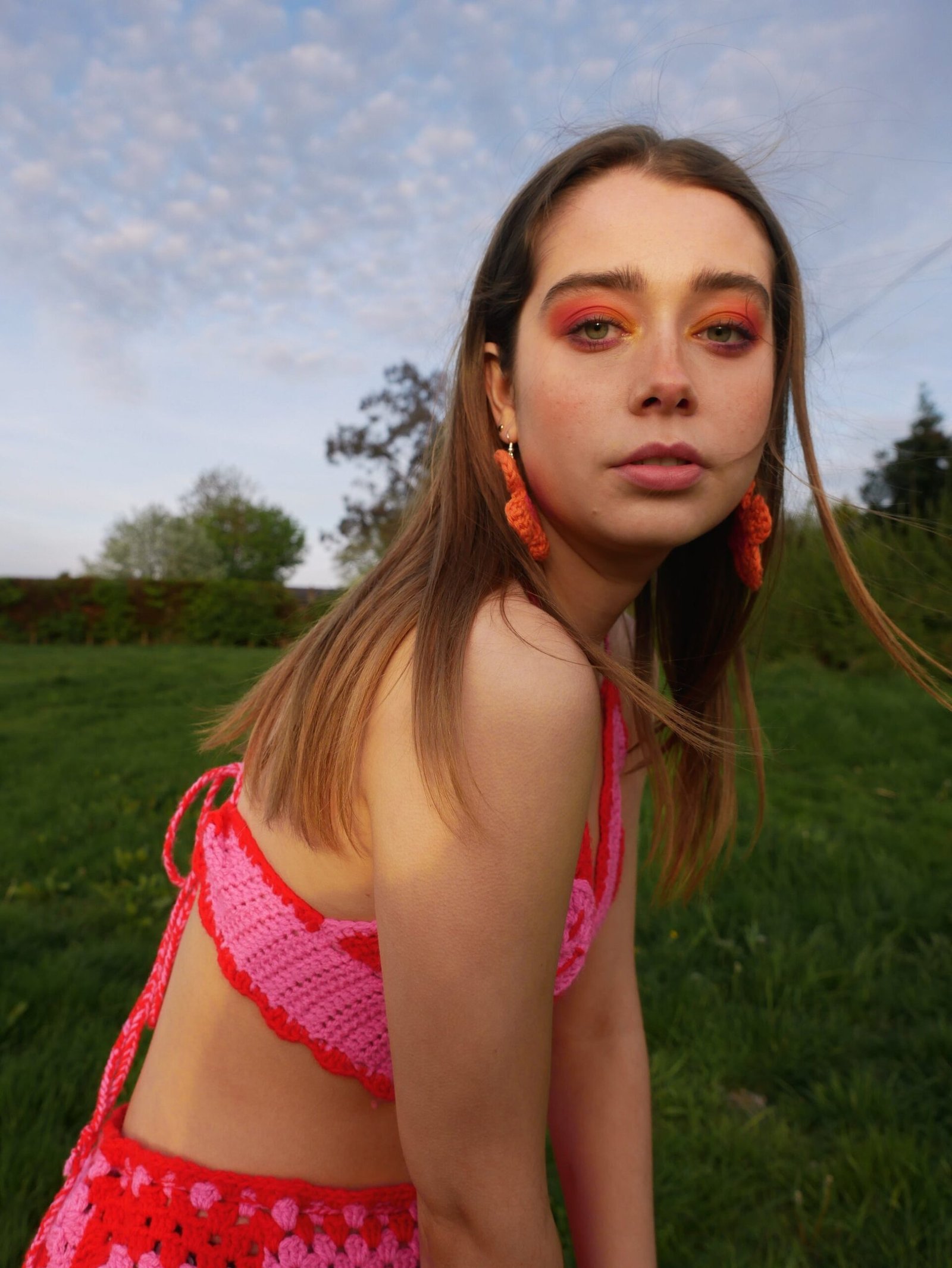 Orange flower crochet earrings Hooked By Lou
